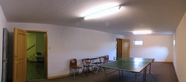 Ping pong in cellar
Room for ping pong in the cellar. Far left is the door to the fallout shelter visible.