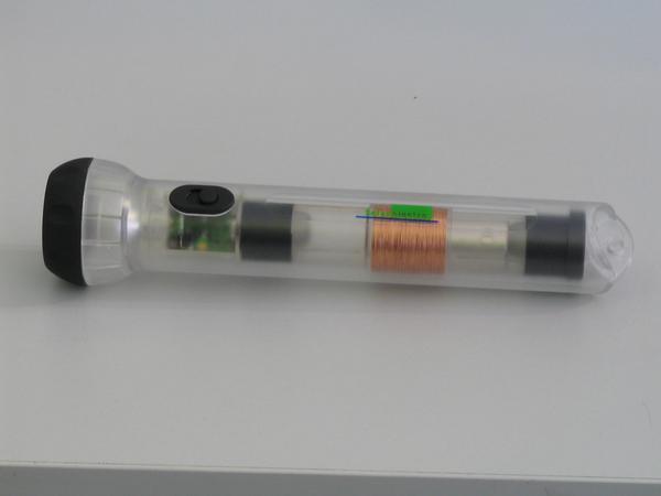 LED Flashlight with generator
In the middle a coil can be seen. In the tube is a permanent magnet. Shake it with the hand and You have light several minutes light from the  LED-lamp.